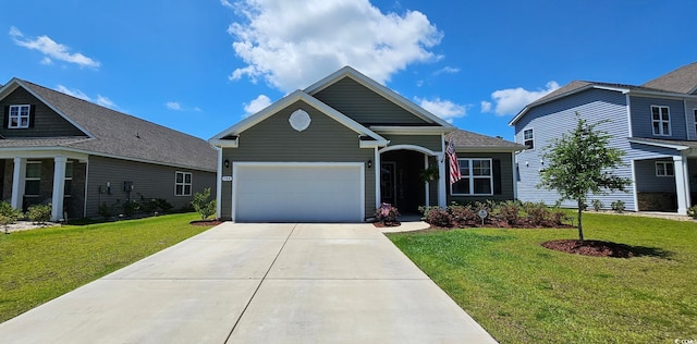 784 Flowering Branch Ave, Little River, SC 29566 - view of front of property featuring concrete driveway, an attached garage, and a front lawn
