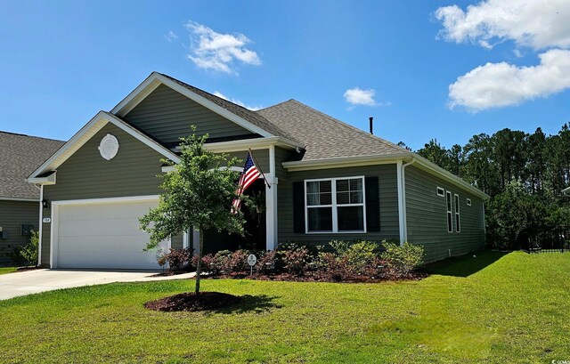 784 Flowering Branch Ave, Little River, SC 29566 - view of front of house with driveway, an attached garage, a front yard, and roof with shingles