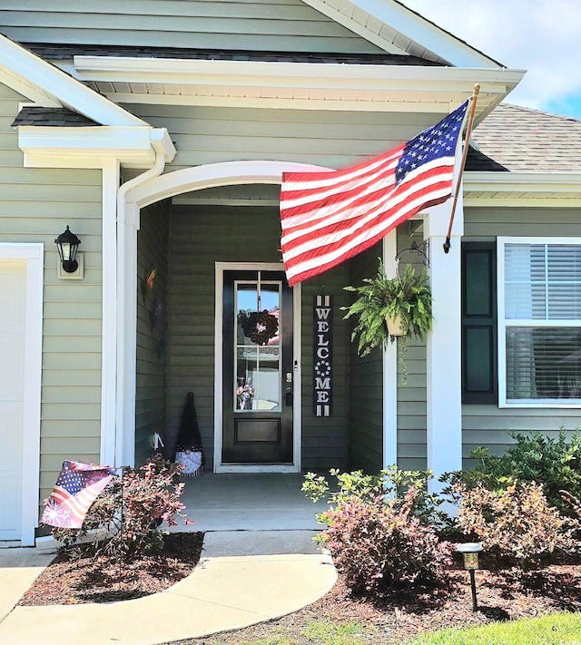 784 Flowering Branch Ave, Little River, SC 29566 - doorway to property featuring covered porch