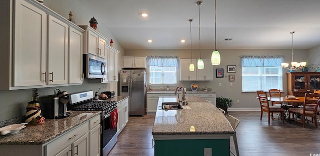 784 Flowering Branch Ave, Little River, SC 29566 - kitchen featuring appliances with stainless steel finishes, a chandelier, dark wood-style flooring, a center island with sink, and recessed lighting
