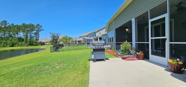 784 Flowering Branch Ave, Little River, SC 29566 - view of grassy yard with a patio area, a water view, and a residential view