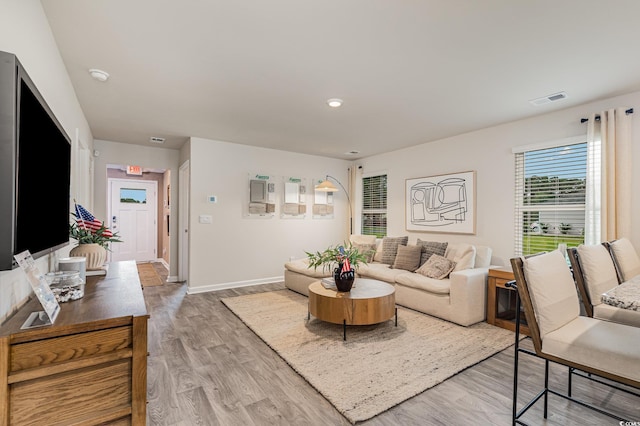 1710 Whispering Pine St, Ocean Isle Beach, NC 28469 - living room with light wood-type flooring