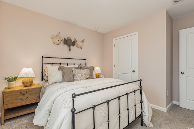1710 Whispering Pine St, Ocean Isle Beach, NC 28469 - bedroom featuring light carpet and baseboards