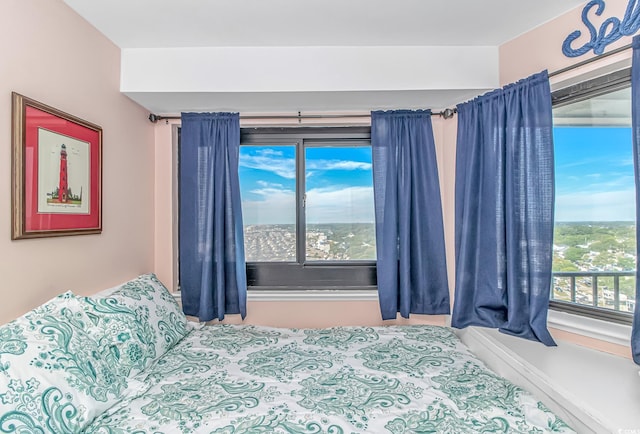 5905 S Kings Hwy Unit 1106, Myrtle Beach, SC 29575 - bedroom featuring multiple windows
