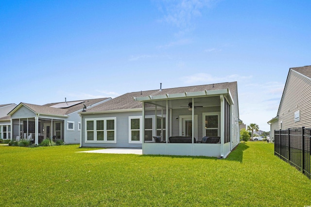 4555 Weekly Dr, Myrtle Beach, SC 29579 - rear view of property with a sunroom, ceiling fan, a patio area, and roof with shingles