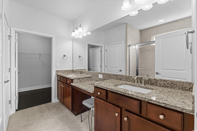 4555 Weekly Dr, Myrtle Beach, SC 29579 - bathroom featuring a stall shower, vanity, and a spacious closet