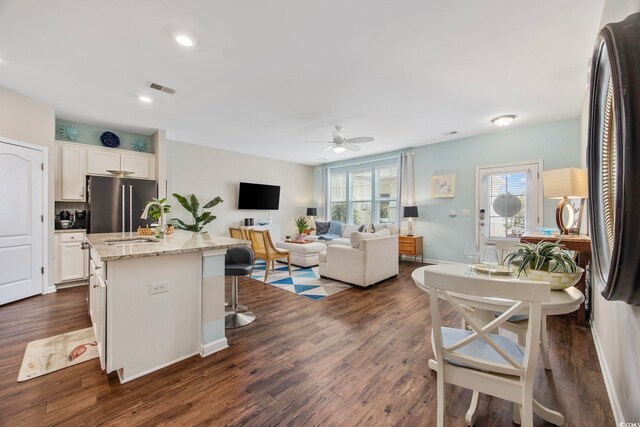 2504 Heritage Loop Unit 2504, Myrtle Beach, SC 29577 - kitchen with ceiling fan, freestanding refrigerator, plenty of natural light, white cabinets, and recessed lighting