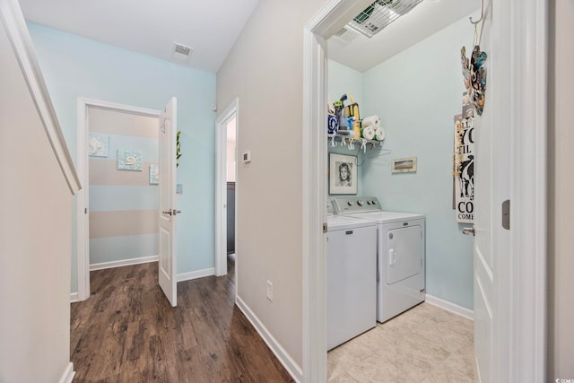 2504 Heritage Loop Unit 2504, Myrtle Beach, SC 29577 - laundry area featuring independent washer and dryer, light wood-style floors, and baseboards