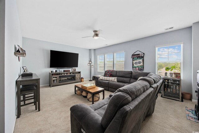 2504 Heritage Loop Unit 2504, Myrtle Beach, SC 29577 - living area featuring light colored carpet, ceiling fan, and baseboards
