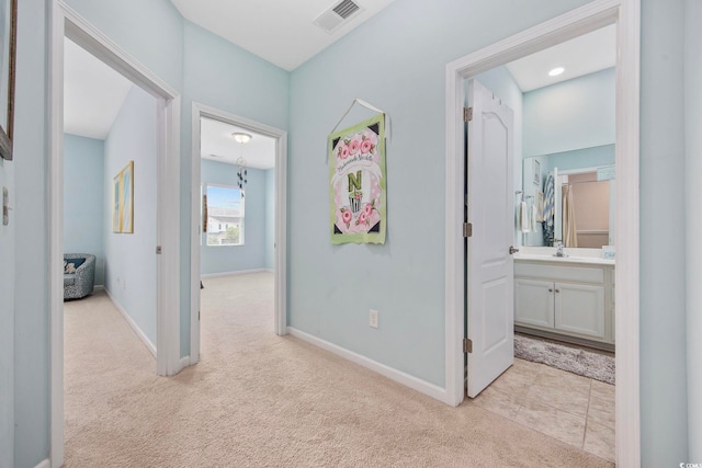 2504 Heritage Loop Unit 2504, Myrtle Beach, SC 29577 - corridor featuring light colored carpet, baseboards, and a sink