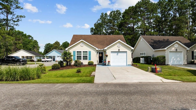 6681 Wisteria Dr, Myrtle Beach, SC 29588 - ranch-style house featuring driveway, a front yard, and a garage
