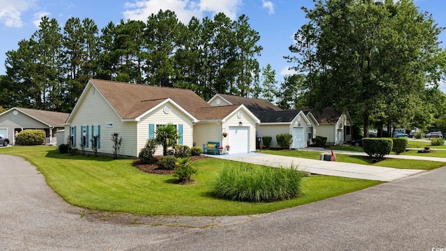6681 Wisteria Dr, Myrtle Beach, SC 29588 - single story home with driveway, a front lawn, and an attached garage