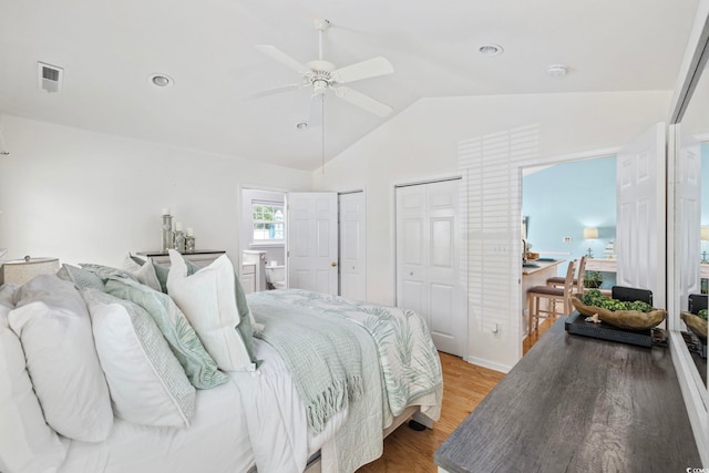6681 Wisteria Dr, Myrtle Beach, SC 29588 - bedroom with multiple closets, vaulted ceiling, wood finished floors, ceiling fan, and recessed lighting