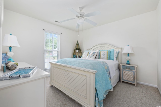 6681 Wisteria Dr, Myrtle Beach, SC 29588 - bedroom featuring light colored carpet, ceiling fan, and baseboards