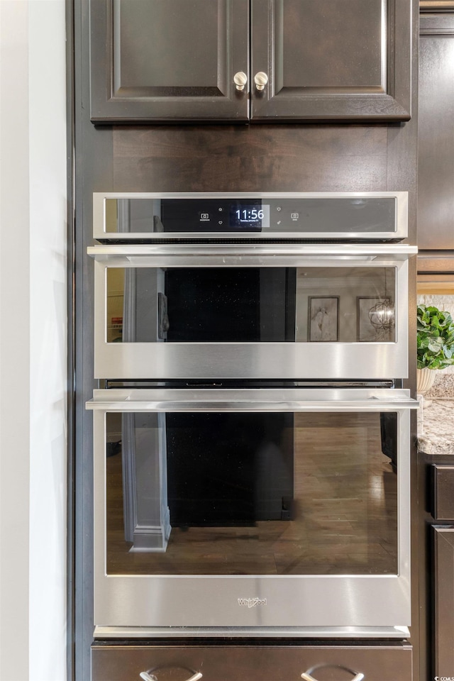 6378 Torino Ln, Myrtle Beach, SC 29572 - kitchen view of stainless steel double oven, dark brown cabinets, and light countertops