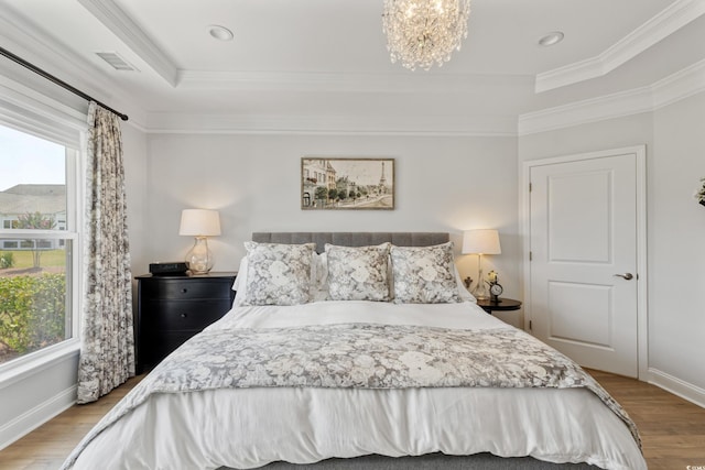 6378 Torino Ln, Myrtle Beach, SC 29572 - bedroom with a raised ceiling, wood finished floors, ornamental molding, baseboards, and recessed lighting