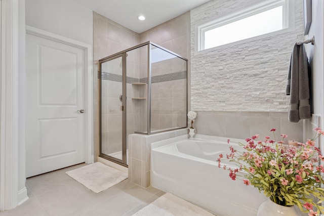 6378 Torino Ln, Myrtle Beach, SC 29572 - bathroom featuring a garden tub, a stall shower, and tile patterned floors