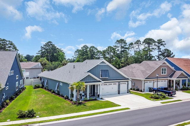 1352 Jolly Roger Dr, North Myrtle Beach, SC 29582 - craftsman inspired home featuring board and batten siding, driveway, and a shingled roof