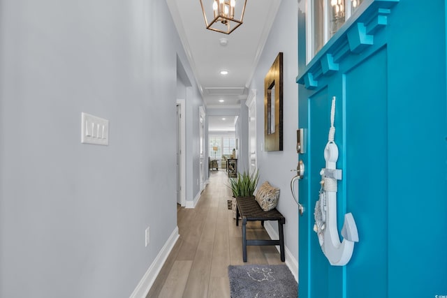 1352 Jolly Roger Dr, North Myrtle Beach, SC 29582 - corridor with baseboards, ornamental molding, light wood-style floors, a chandelier, and recessed lighting
