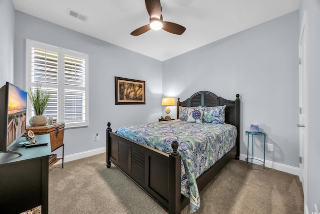 1352 Jolly Roger Dr, North Myrtle Beach, SC 29582 - carpeted bedroom featuring baseboards and ceiling fan
