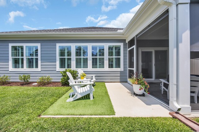 1352 Jolly Roger Dr, North Myrtle Beach, SC 29582 - view of green lawn with a patio