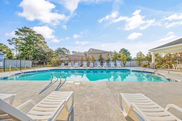 1352 Jolly Roger Dr, North Myrtle Beach, SC 29582 - community pool with a patio