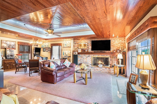 328 Waterside Dr, Myrtle Beach, SC 29577 - living room featuring wood ceiling, a fireplace, ceiling fan, and a chandelier