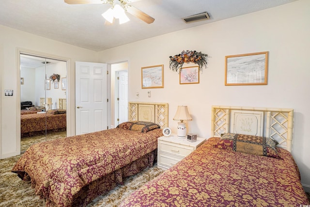 328 Waterside Dr, Myrtle Beach, SC 29577 - carpeted bedroom with a ceiling fan and a closet