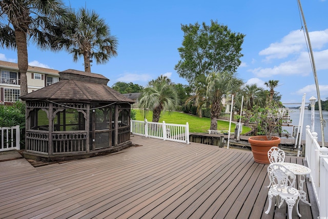 328 Waterside Dr, Myrtle Beach, SC 29577 - wooden terrace featuring a gazebo, a water view, and a lawn