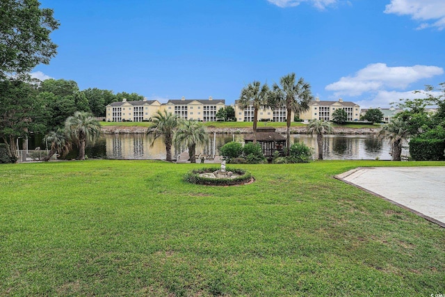 328 Waterside Dr, Myrtle Beach, SC 29577 - view of green lawn featuring a water view and a residential view