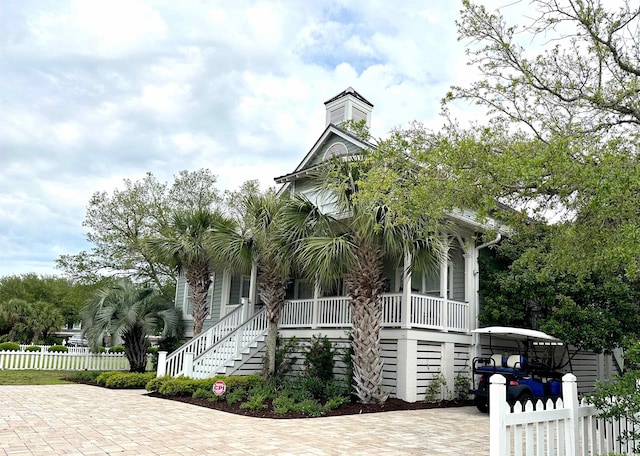 70 Beachwalker Ct, Georgetown, SC 29440 - view of front of property with stairway, covered porch, and driveway