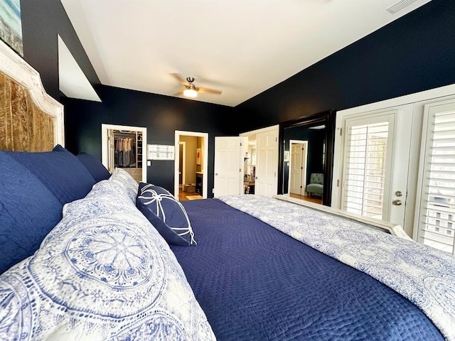 70 Beachwalker Ct, Georgetown, SC 29440 - bedroom with a spacious closet, ceiling fan, access to outside, a closet, and connected bathroom