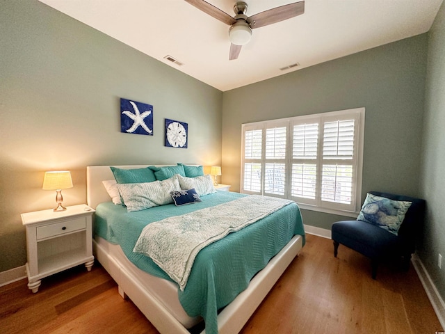 70 Beachwalker Ct, Georgetown, SC 29440 - bedroom featuring wood finished floors, baseboards, and ceiling fan