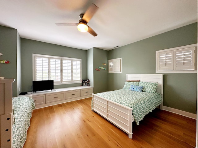 70 Beachwalker Ct, Georgetown, SC 29440 - bedroom featuring light wood-style flooring, ceiling fan, and baseboards
