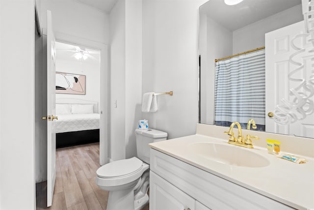 4705 Wild Iris Dr Unit 201, Myrtle Beach, SC 29577 - full bath with vanity, toilet, wood finished floors, ensuite bath, and a shower with shower curtain