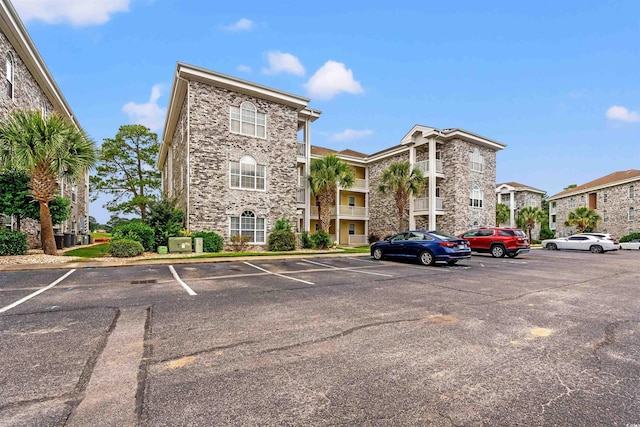 4705 Wild Iris Dr Unit 201, Myrtle Beach, SC 29577 - view of property with uncovered parking