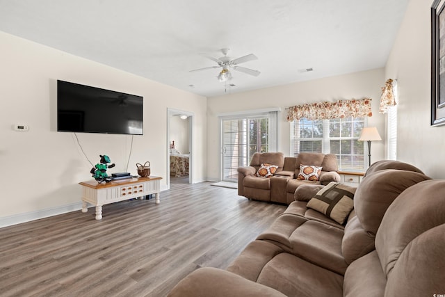 6000 Windsor Green Way Unit 104, Myrtle Beach, SC 29579 - living area featuring a ceiling fan and wood finished floors
