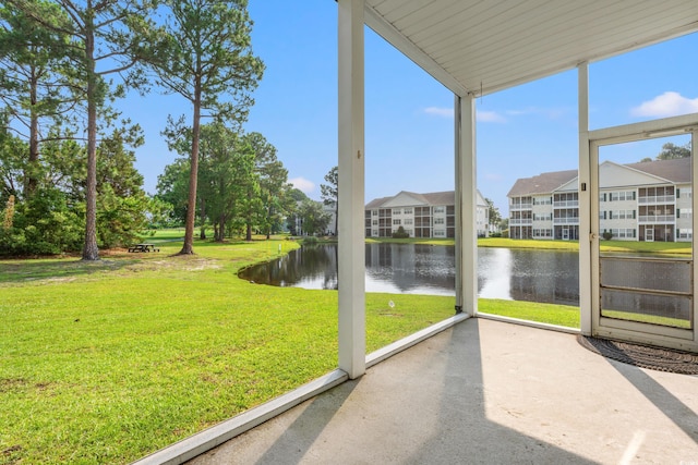 6000 Windsor Green Way Unit 104, Myrtle Beach, SC 29579 - unfurnished sunroom featuring a water view