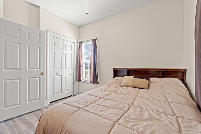 6000 Windsor Green Way Unit 104, Myrtle Beach, SC 29579 - bedroom featuring wood finished floors and a closet
