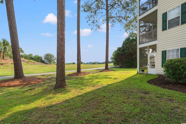 6000 Windsor Green Way Unit 104, Myrtle Beach, SC 29579 - view of green lawn with a balcony