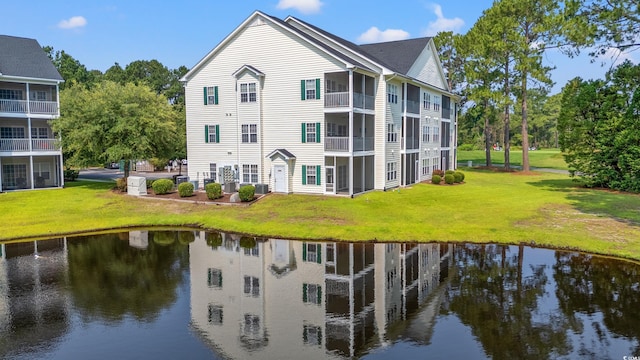 6000 Windsor Green Way Unit 104, Myrtle Beach, SC 29579 - view of building exterior featuring a water view