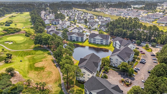6000 Windsor Green Way Unit 104, Myrtle Beach, SC 29579 - aerial perspective of suburban area featuring a local golf course and a large body of water