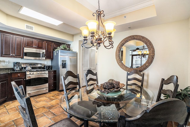 100 N Beach Blvd Unit 710, North Myrtle Beach, SC 29582 - dining area with a chandelier, ornamental molding, and stone tile floors