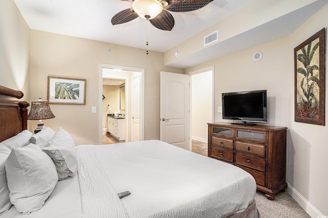 100 N Beach Blvd Unit 710, North Myrtle Beach, SC 29582 - bedroom featuring connected bathroom and a ceiling fan