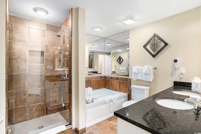 100 N Beach Blvd Unit 710, North Myrtle Beach, SC 29582 - bathroom with vanity, a stall shower, a bath, and stone finish flooring