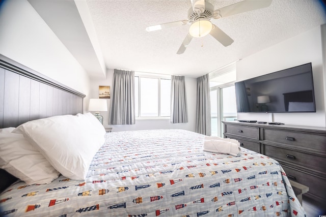1903 S Ocean Blvd Unit 1110, North Myrtle Beach, SC 29582 - bedroom with a textured ceiling and ceiling fan