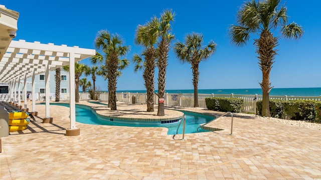 1903 S Ocean Blvd Unit 1110, North Myrtle Beach, SC 29582 - community pool with a fenced backyard, a patio area, a pergola, and a hot tub