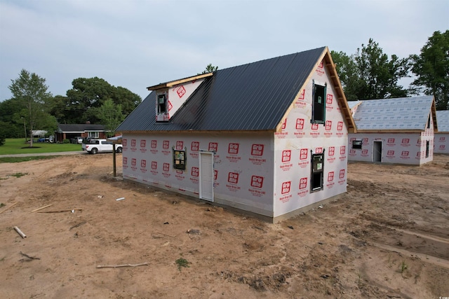 402 S Magnolia Ave, Andrews, SC 29510 - view of side of home with a metal roof