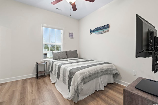 4331 Grande Harbour Blvd, Little River, SC 29566 - bedroom featuring wood finished floors and ceiling fan