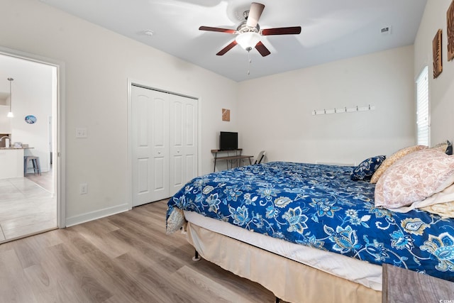 4331 Grande Harbour Blvd, Little River, SC 29566 - bedroom featuring wood finished floors, a closet, and a ceiling fan